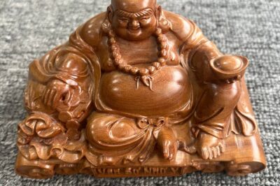 The Wooden Laughing Buddha: A Symbol of Prosperity and Joy